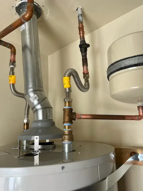 Water heater installation and plumbing repair in Plumbush